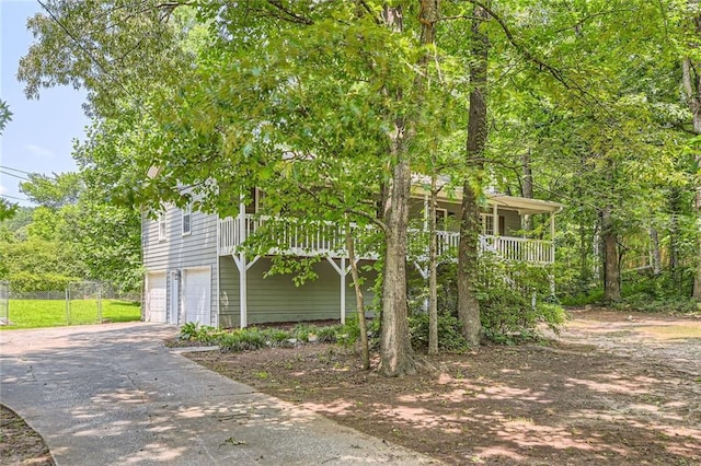 62 Sweetwater Pkwy, Powder Springs, GA 30127 - view of property exterior with concrete driveway and an attached garage