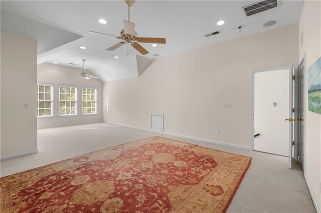 unfurnished living room featuring carpet flooring, baseboards, a ceiling fan, and visible vents