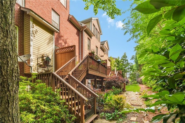 view of property featuring stairway