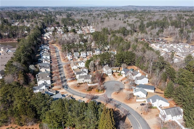 bird's eye view with a residential view and a forest view