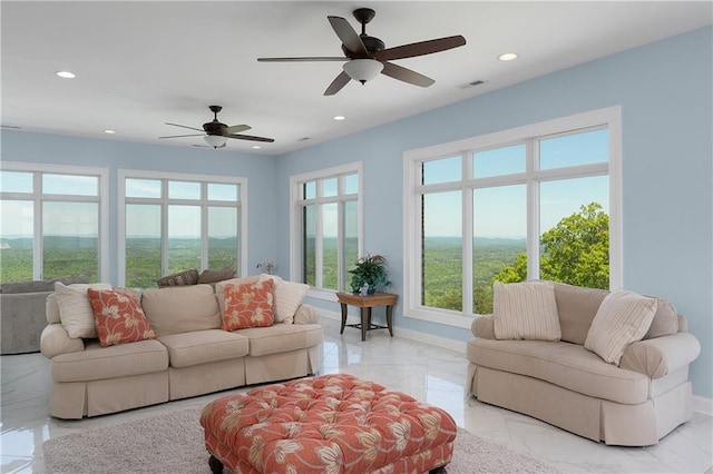 living room featuring plenty of natural light