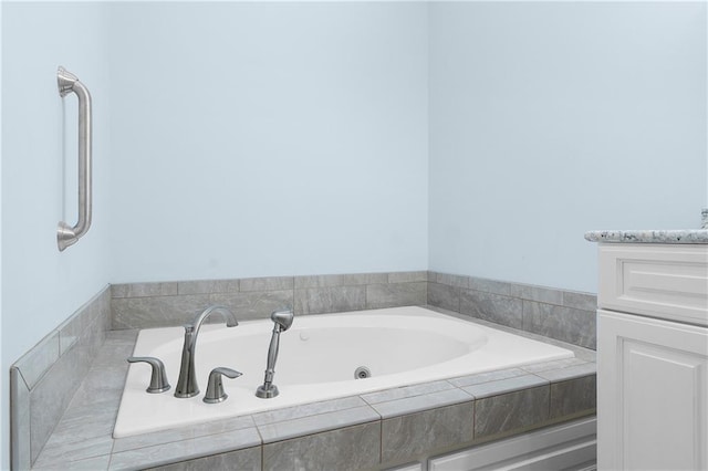 bathroom featuring a relaxing tiled tub