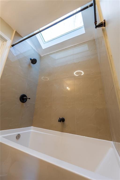 bathroom with a skylight