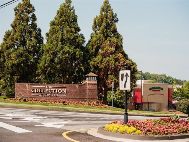 view of community sign