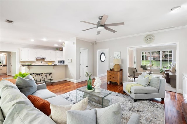 1558 Amberwood Creek Dr NW, Kennesaw, GA 30152 - living room with ornamental molding, ceiling fan, light wood-style floors, and recessed lighting