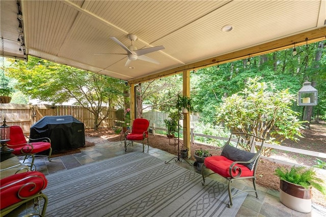 1558 Amberwood Creek Dr NW, Kennesaw, GA 30152 - wooden terrace with area for grilling, ceiling fan, a patio area, and a fenced backyard