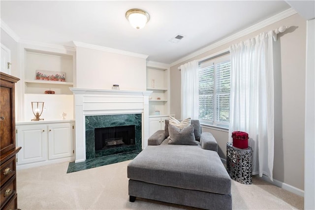 1558 Amberwood Creek Dr NW, Kennesaw, GA 30152 - sitting room featuring light carpet, a fireplace, ornamental molding, and built in shelves