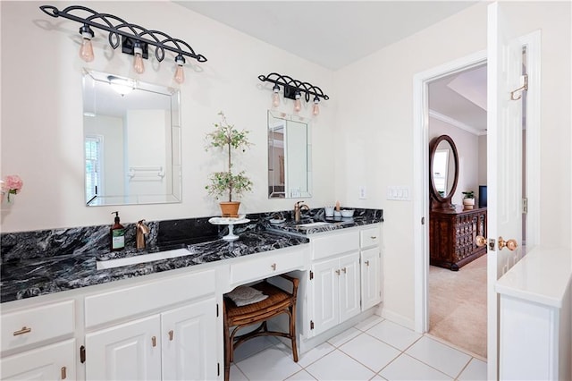 1558 Amberwood Creek Dr NW, Kennesaw, GA 30152 - bathroom with double vanity, healthy amount of natural light, tile patterned flooring, and ornamental molding
