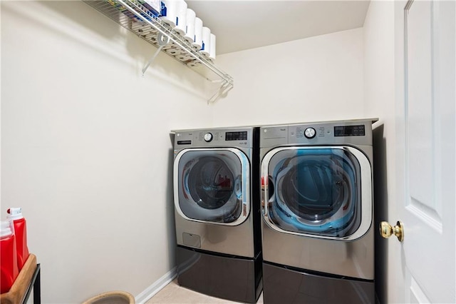 1558 Amberwood Creek Dr NW, Kennesaw, GA 30152 - washroom with independent washer and dryer and tile patterned flooring