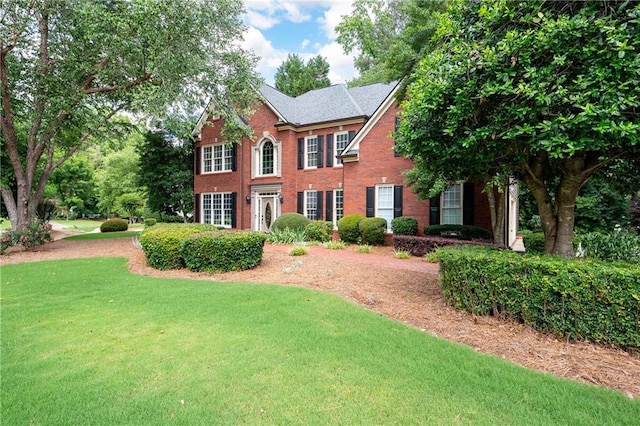 1558 Amberwood Creek Dr NW, Kennesaw, GA 30152 - colonial house with brick siding and a front lawn