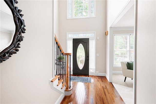 1558 Amberwood Creek Dr NW, Kennesaw, GA 30152 - foyer entrance with light wood-style flooring and stairs