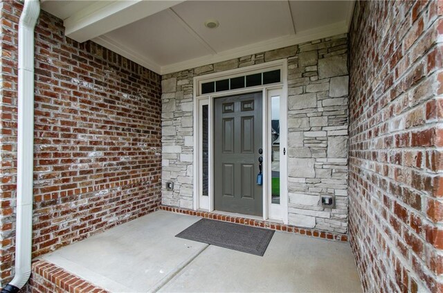 foyer entrance with hardwood / wood-style flooring