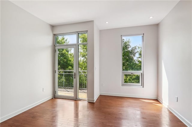 empty room featuring dark hardwood / wood-style floors