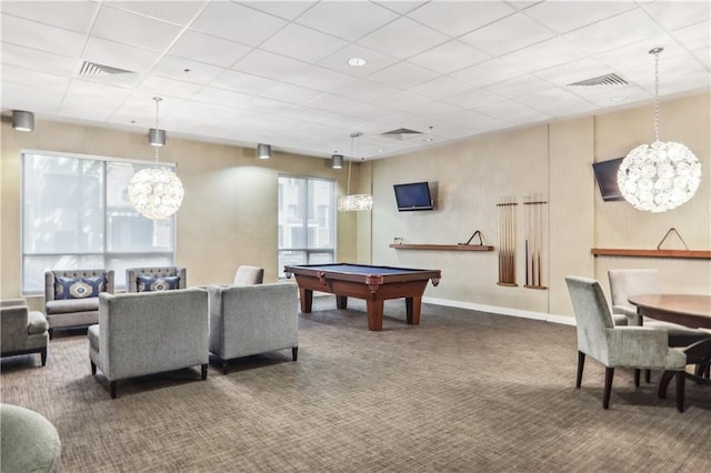 rec room with a paneled ceiling, pool table, and dark colored carpet