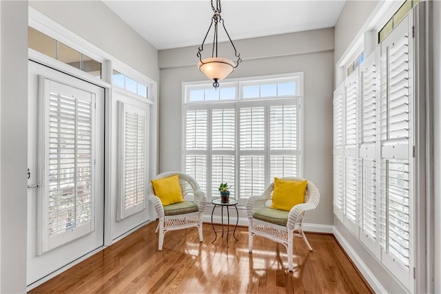 sitting room with hardwood / wood-style floors