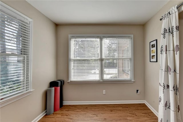 unfurnished room featuring light hardwood / wood-style flooring