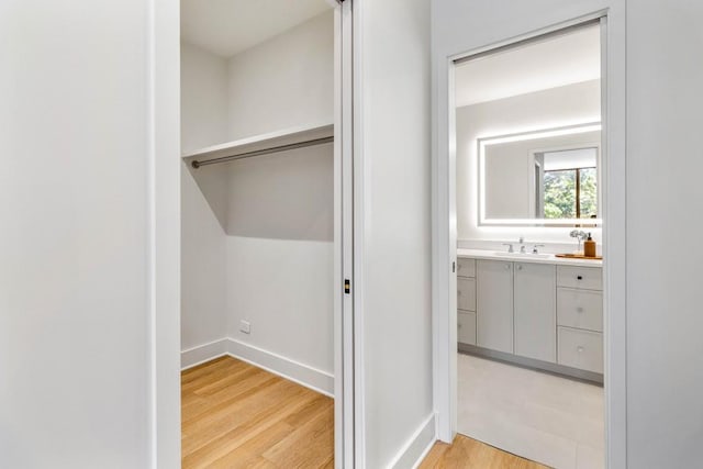 closet featuring a sink