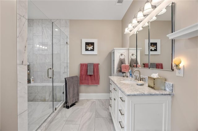 bathroom featuring vanity and walk in shower