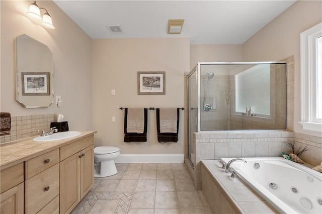 full bathroom featuring tile patterned flooring, toilet, separate shower and tub, and vanity