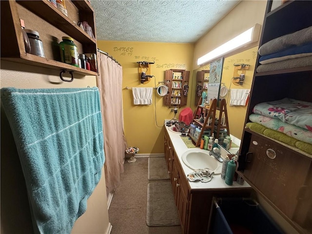135 Woodcrest Dr, Covington, GA 30016 - full bath featuring vanity, a textured ceiling, and a shower with shower curtain