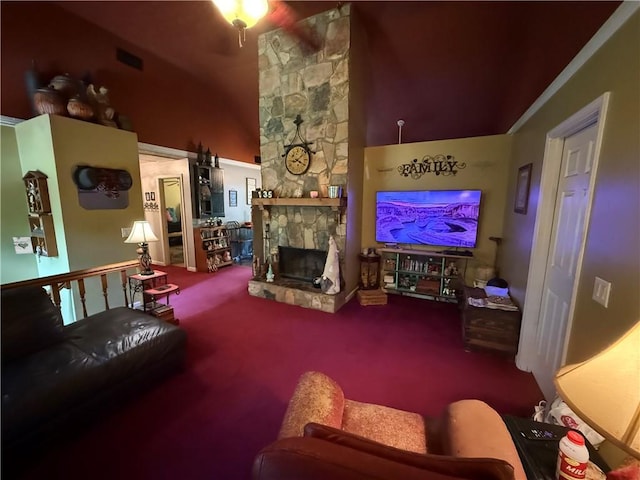 135 Woodcrest Dr, Covington, GA 30016 - carpeted living room featuring a stone fireplace and lofted ceiling