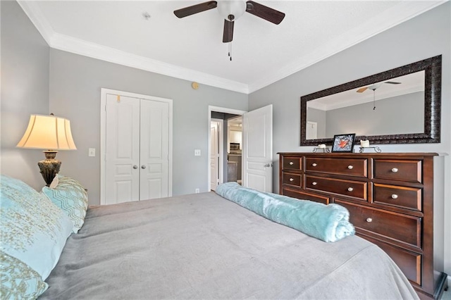 bedroom featuring a closet, ceiling fan, and ornamental molding