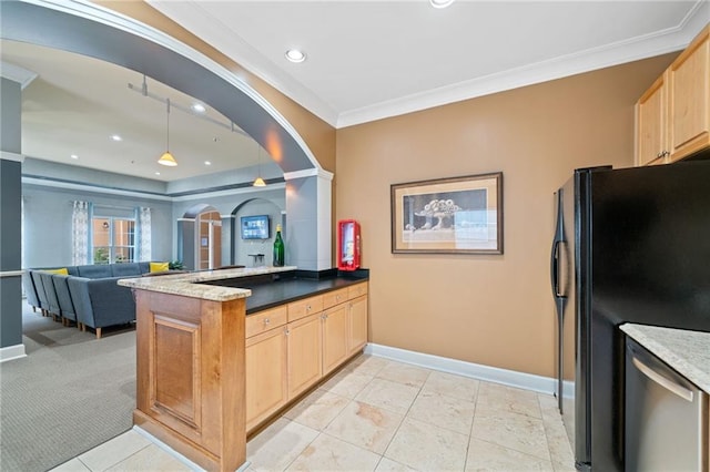 kitchen featuring black refrigerator, kitchen peninsula, light colored carpet, crown molding, and light brown cabinets