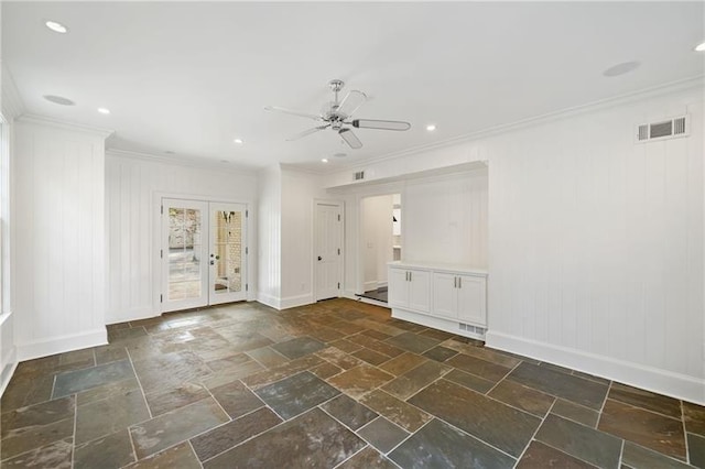 unfurnished room with ornamental molding, ceiling fan, and french doors