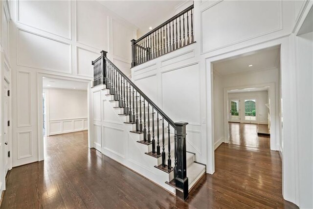 stairway with wood-type flooring