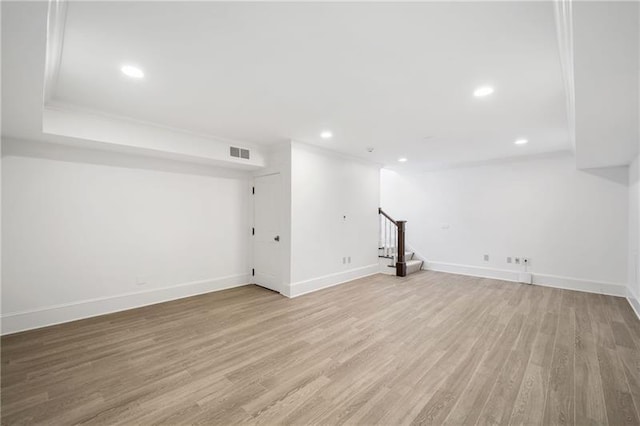 basement featuring light hardwood / wood-style floors