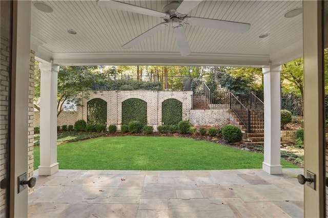 view of patio / terrace featuring ceiling fan