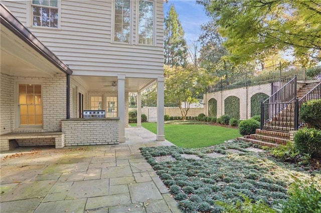 view of patio with ceiling fan