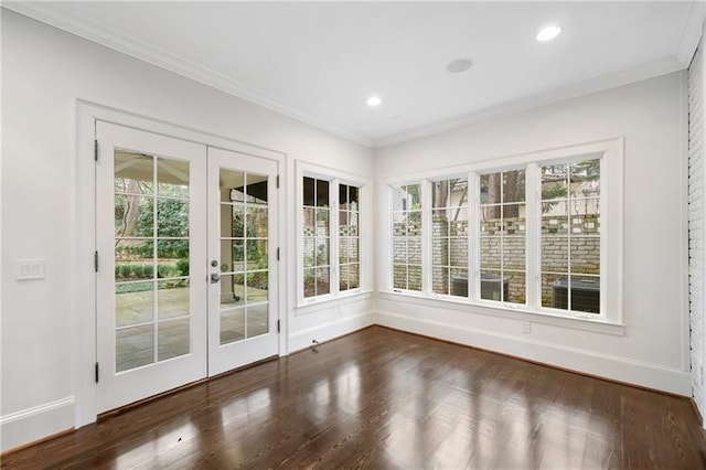 unfurnished sunroom with french doors