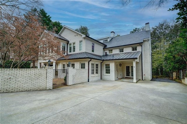 back of house with a patio area