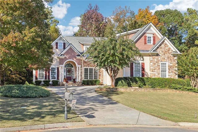 view of front of property with a front lawn