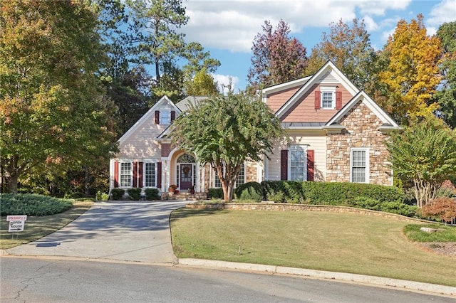 view of front facade with a front lawn