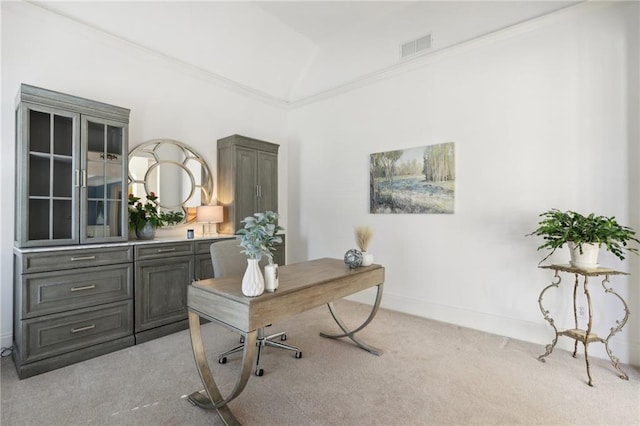 carpeted office featuring crown molding and vaulted ceiling