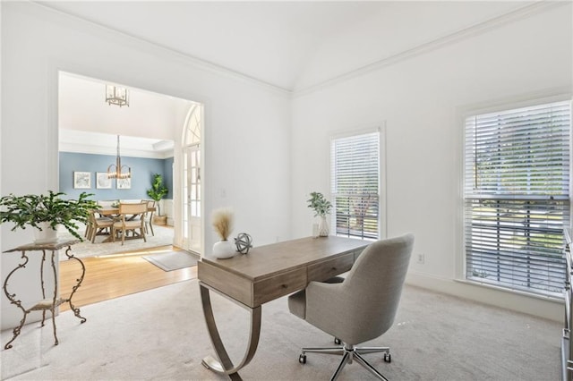 office space with an inviting chandelier, crown molding, and hardwood / wood-style flooring