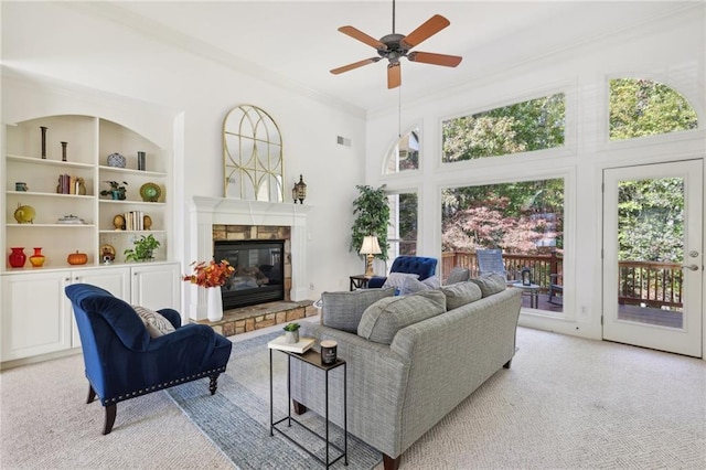 living room featuring a towering ceiling and light carpet