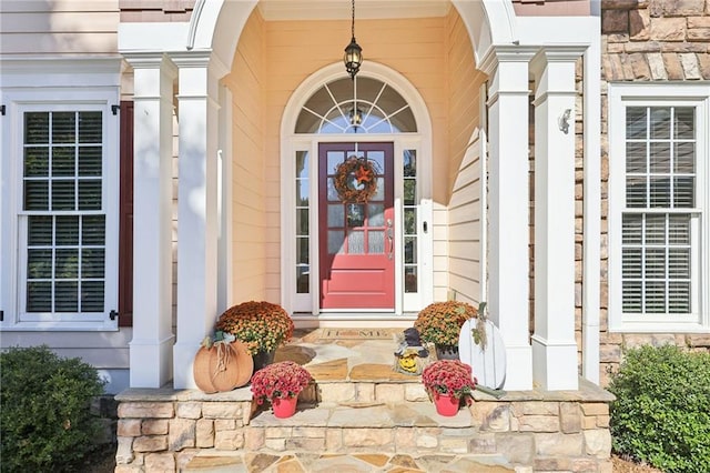 property entrance featuring covered porch