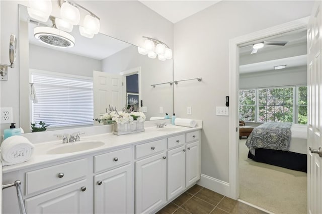 bathroom with vanity, ceiling fan, and tile patterned flooring