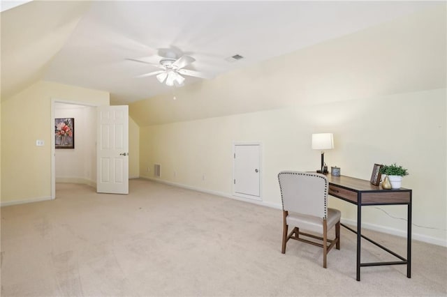 carpeted office featuring ceiling fan and vaulted ceiling