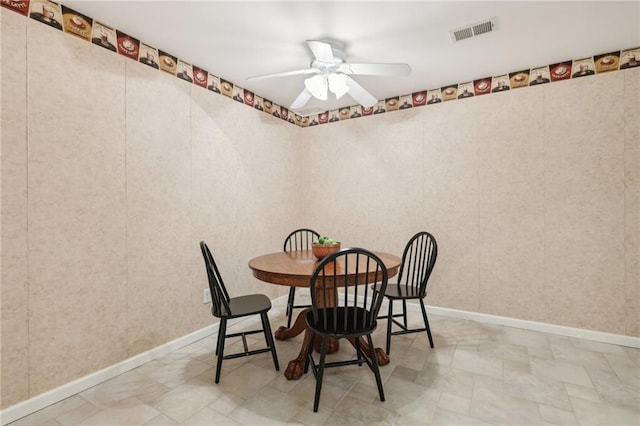 dining space featuring ceiling fan