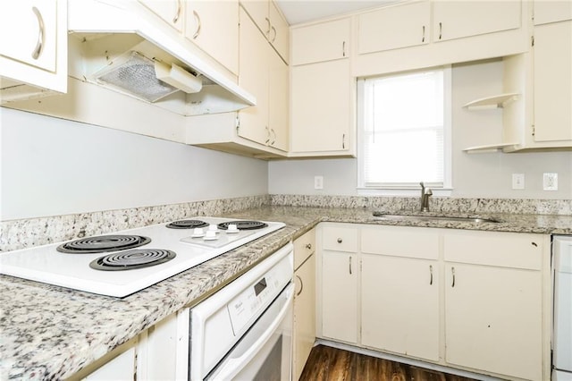 kitchen featuring a sink, open shelves, under cabinet range hood, dark wood-style floors, and white appliances