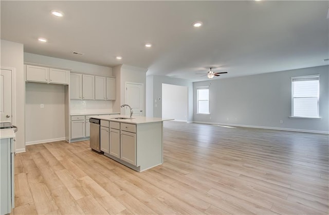 20 Fayme Ct, Newnan, GA 30263 - kitchen featuring a sink, ceiling fan, stainless steel dishwasher, baseboards, and recessed lighting