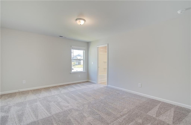 20 Fayme Ct, Newnan, GA 30263 - spare room featuring baseboards and light colored carpet