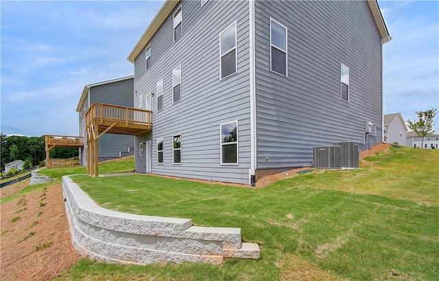 20 Fayme Ct, Newnan, GA 30263 - rear view of property featuring a wooden deck and a lawn