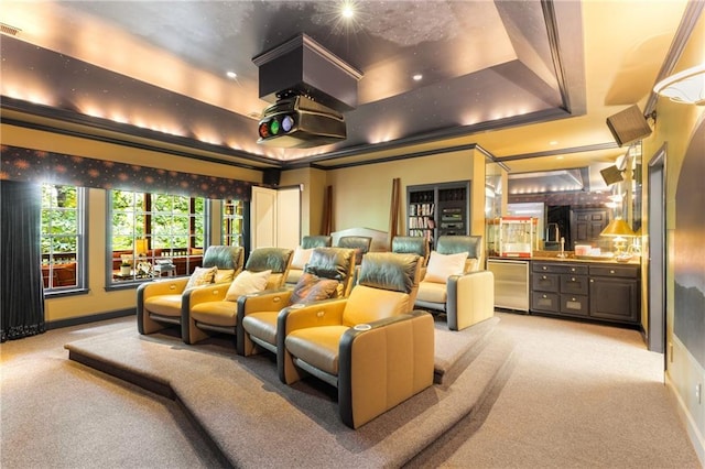 4789 Crest Park Ln, Marietta, GA 30068 - home theater with a tray ceiling, light colored carpet, bar area, and crown molding