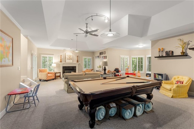 4789 Crest Park Ln, Marietta, GA 30068 - game room with ceiling fan, carpet flooring, a tiled fireplace, healthy amount of natural light, and crown molding