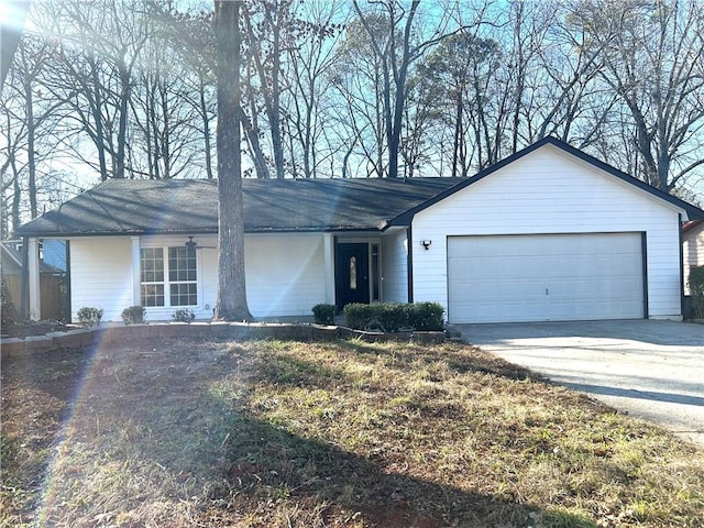 single story home with a garage